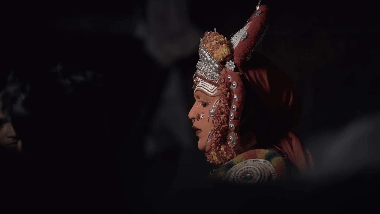Thirayattam performer in profile
