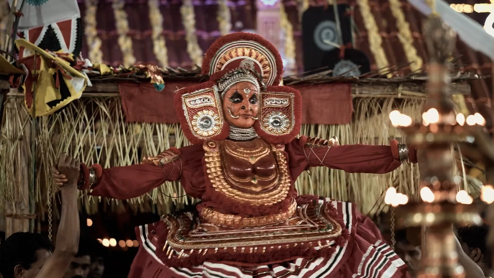 Thirayattam performance with lamps
