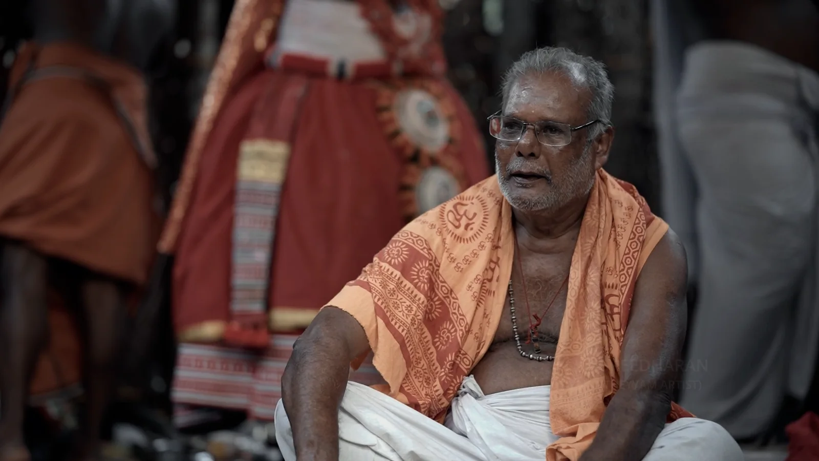 Elder ritual performer sitting